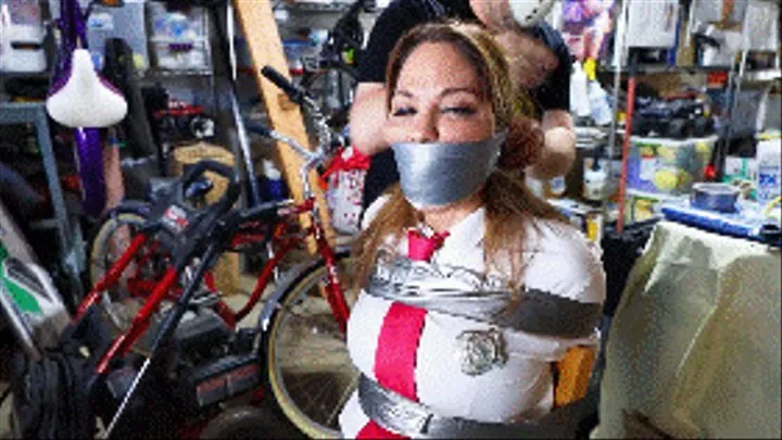 Massive wraparound tape gag to keep loud detective Anna Lee shut!