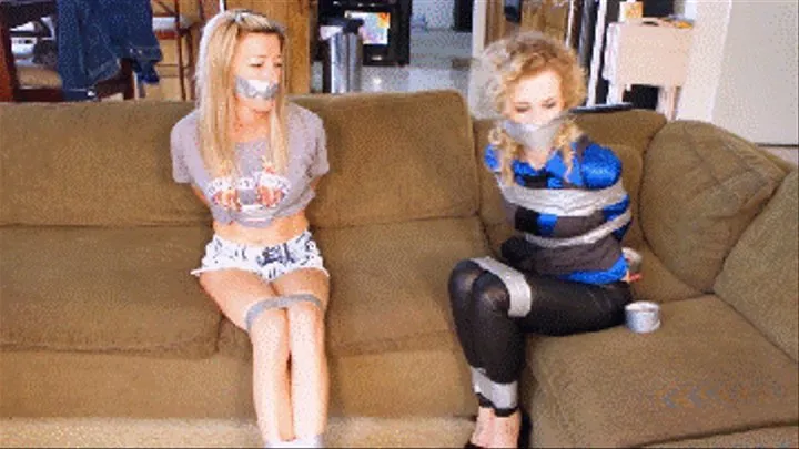 Rocker housewife Amanda Kent keeps nerd girl Catie Parker tied and gagged to teach her a lesson