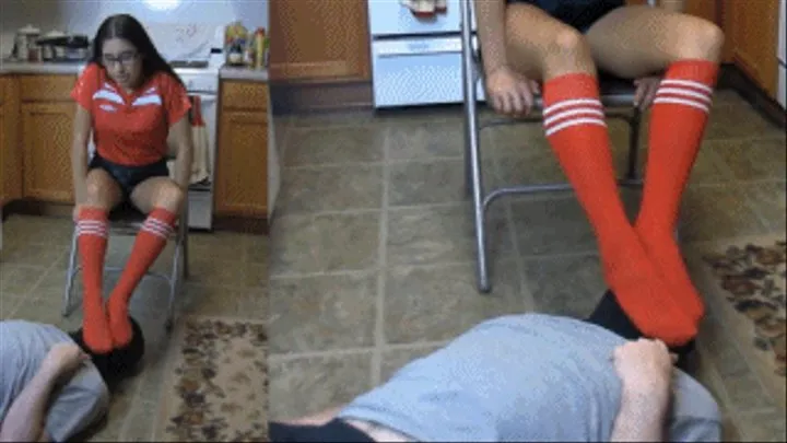 Soccer girl eRica captures her coach for the holidays and smothers him with her soccer sock covered feet!