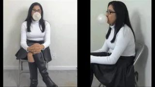 eRica shows us how she chews gum and blows bubbles while wearing a white turtleneck and leather skirt. .