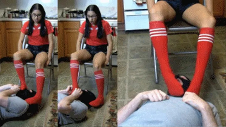 Soccer girl eRica captures her coach for the holidays and smothers him with her soccer sock covered feet!!