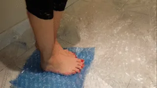 Mistress Stepping on Bubble wrap barefoot in flip flops and stiletto heals