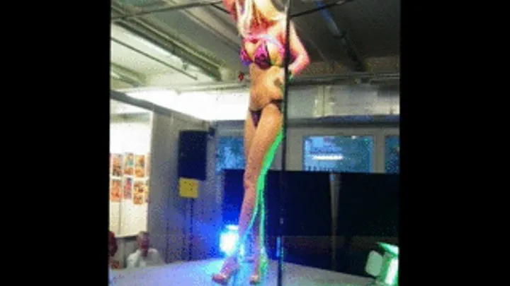 Dancing girl at an erotic exhibition