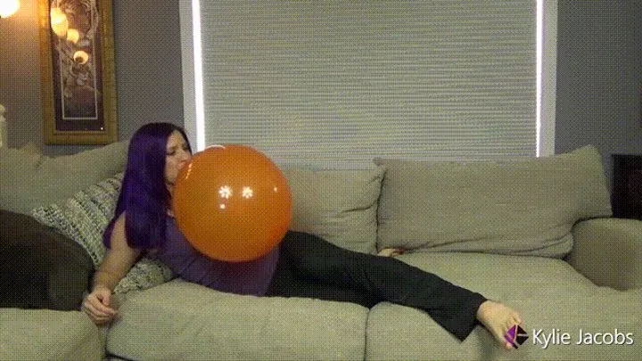 Inflate Orange Wet Balloon To The Max