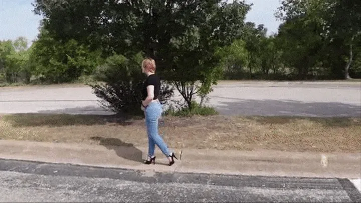 Walking Outdoors in Jeans and Black Sandals