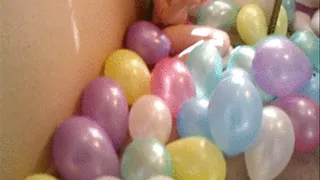 Finger Popping Abunch Of Balloons
