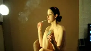 Topless Smoking A Cigarette While Popping And Blowing Up Balloons
