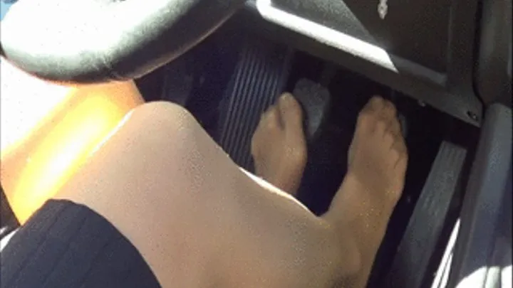 DownShifting and driving fast wearing stockings barefoot and miniskirt