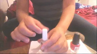 Applying Pink Nail Polish To Finger Nails