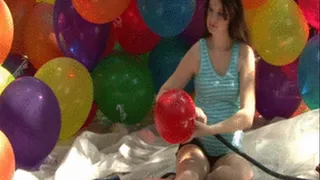 Yellow Balloon Blow to Pop Outside