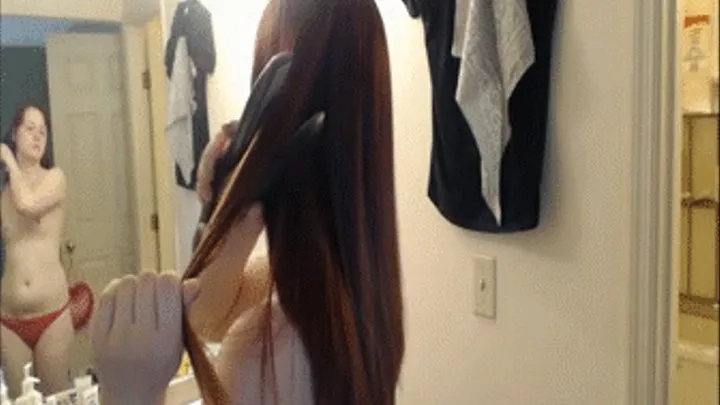 Straightening and brushing my red hair