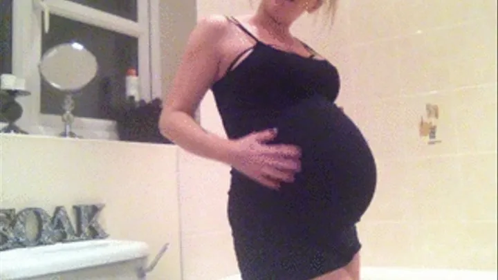 heavily pregnant stripping out of tight black sexy dress