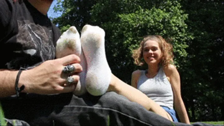 Chloe tickled in socks in the park