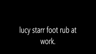 lucy starr rubbing feet at work