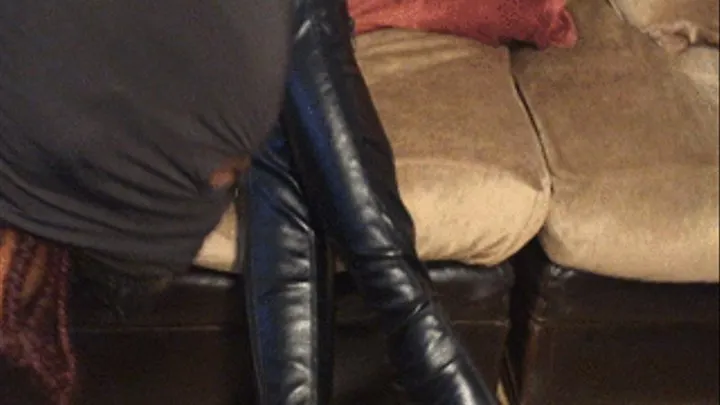 Leather boot worship slave receives a foot job reward