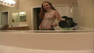 Redhead babe teases her pierced pussy