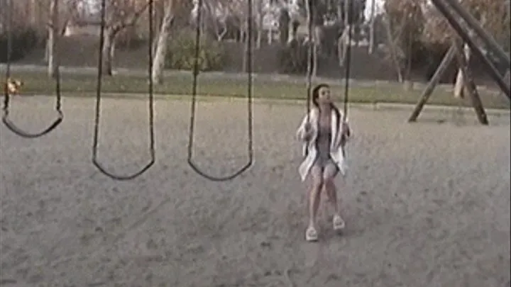 Sexy slut takes a piss in a playground