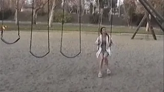 Sexy slut takes a piss in a playground
