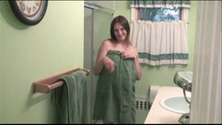 Pregnant step-mom under the shower toying her pussy