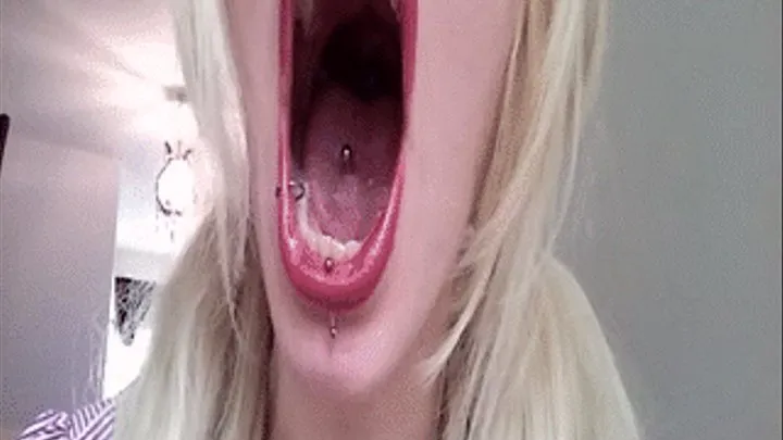 beautiful lips open wide for long yawns