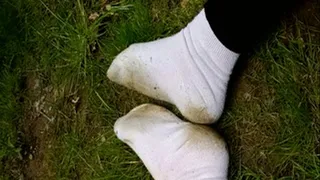 light coloured socks dirtied up on grass