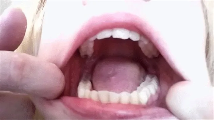 using tongue and finger to clean teeth no piercings or lipstick