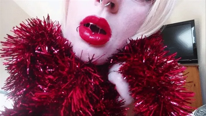 red sexy glossy lips to match red tinsel