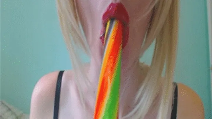 red lips wrapped round candy sucking