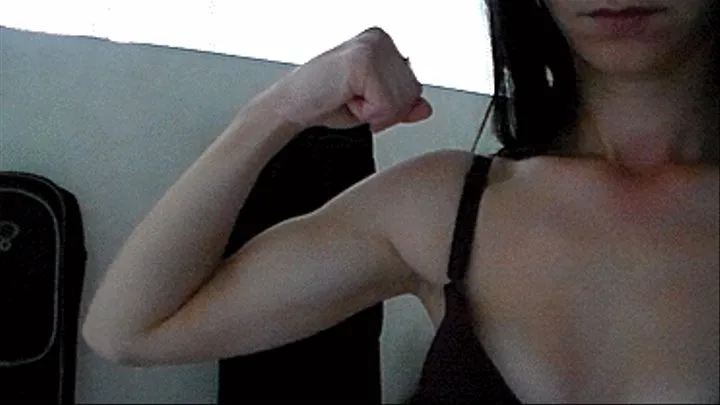 the muscles of this lady, stretch the muscles again and again, biceps, bra, underwear, boobs, show the muscles of the hands,//