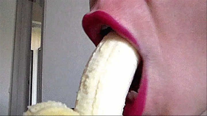 sucking a peeled banan