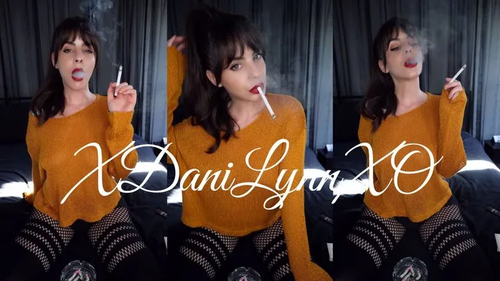 Smoking Wearing Sweater and Stockings