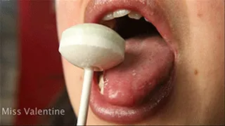 Close-up sexy and sensual lollipop licking, sucking, and biting