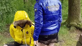 With the glossy down jacket at the lake
