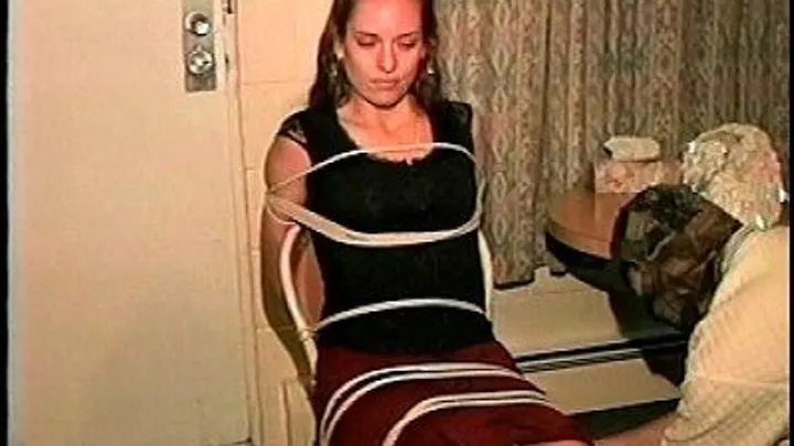 TAG Kimberly 1- Surprised, Hand Gagged, Tied To Chair, Mouth Packed, Scarf Cleave Gag