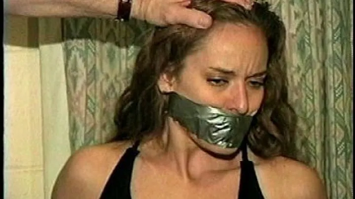 TAG Kimberly 9- Self Bondage, Tape Gagged, Hand Cuffed, Hand Gagging