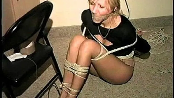 TAG Marcella 3- Mouth Pack Gag, Tape Wrapped Several Times Around Head, Ball Tied, Toes Tied, Blindfold, Romanian