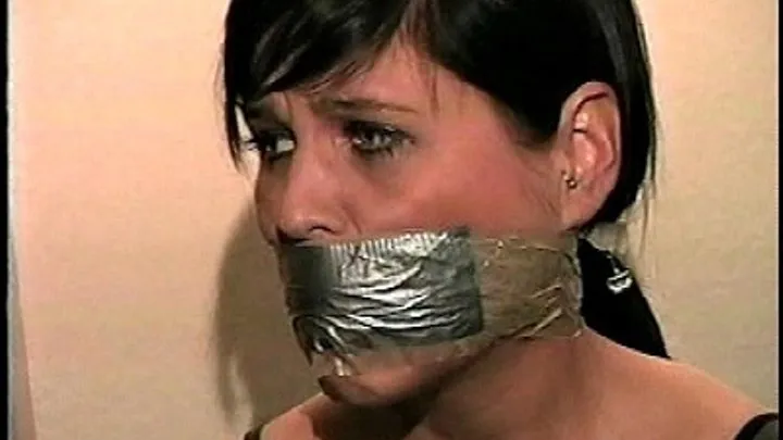 TAG Leslie 2- Wrap Around Tape Gagging, Ball Tied, Toes Tied, Extra Layer Of Duct Tape Gag