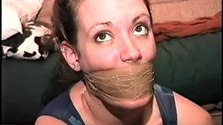 TAG Daisy 3- Wraparound Packing Tape Gag, Mouth Stuffed, Duct Tape, Tied Up