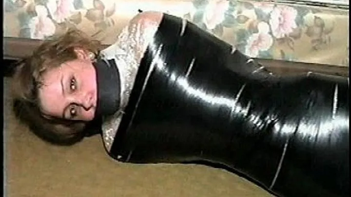 TAg Holly 9- Mummified With Electric Tape Over Plastic Wrap, Gagged, Struggling On Floor