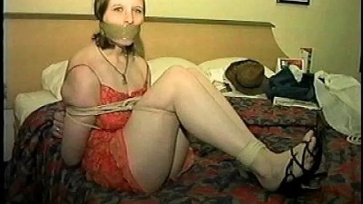 TAG Pandora 4- Mouth Stuffed, Packing Tape Gag Wrapped Around Head, Chair Tied, Ball Tied, Red Dress, Bare Feet, Toes Tied