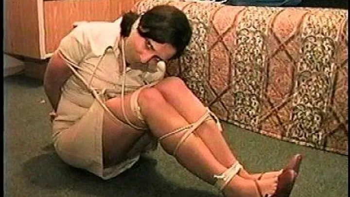 TAG Desiree 4- Tied Up On Floor, Mouth Packed, Packing Tape Gag Wrapped Around Head, Skirt,