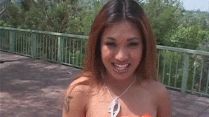 Asian lesbians have outdoor sex with strapon