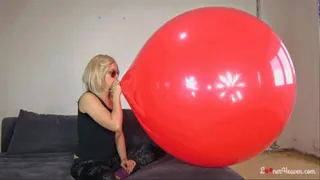 Kia overinflate giant red balloon