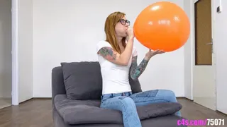 Foxy Sanie licks and inflates a huge balloon