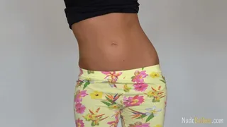 Skinny fitness girl Pauli shows off her tummy and navel