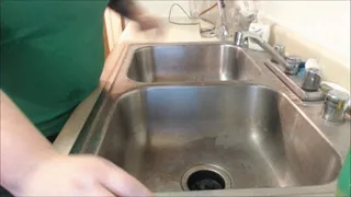 Dunking Head While Washing Hair In Kitchen Sink