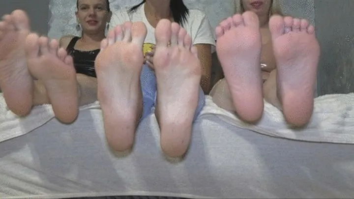 bare feet of different sizes