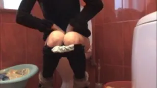 Toilet clip with brown dress, dark pantyhose and fluffy boots