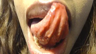 tongue on lip