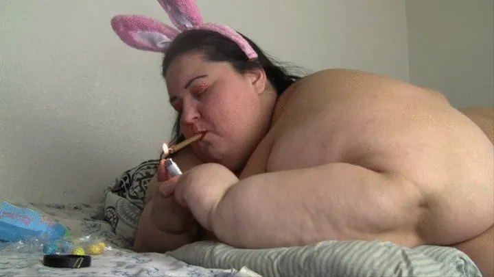 SSBBW Apple Bomb is smoking and blowing smoke in chewing gum in bunny ears